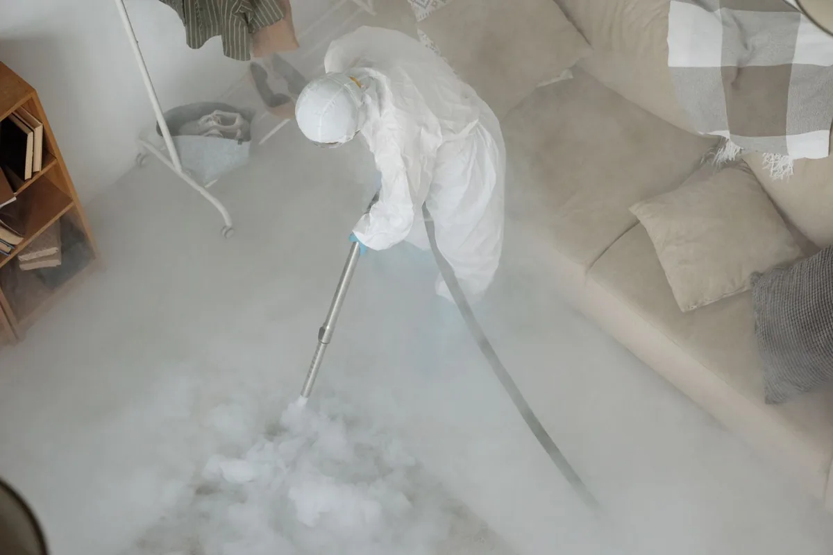Biohazard cleanup technician in protective equipment, Westpark, Irvine, CA